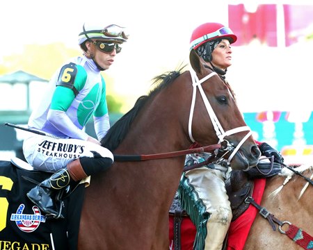 Renegade and jockey Irad Ortiz Jr. in the post parade before winning the Arkansas Derby at Oaklawn Park