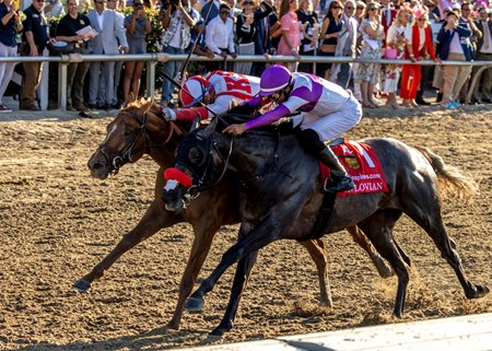 Emerging Market (outside) wins the Louisiana Derby at Fair Grounds Race Course