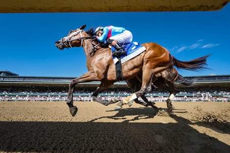 Alpine Princess (inside) wins the Doubledogdare Stakes at Keeneland