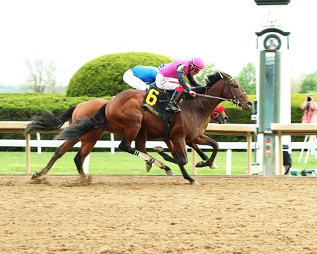 Blessed Flyer wins a maiden special weight race at Keeneland