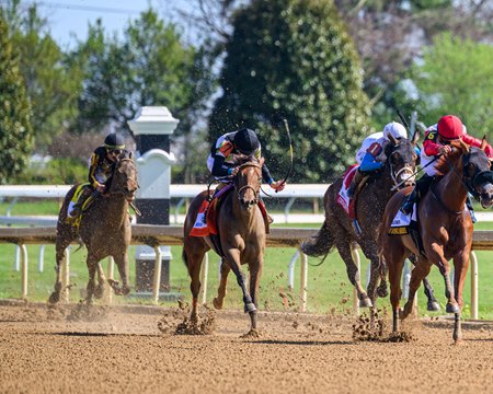 A Fine Chardonnay (outside) wins the Beaumont Stakes at Keeneland
