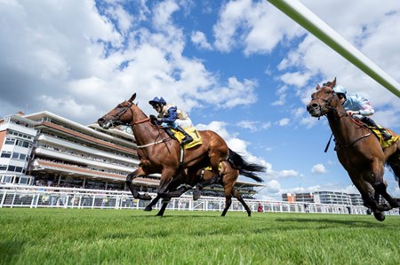Convergent wins the John Porter Stakes at Newbury Racecourse