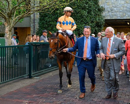 Expensive Queen walks with Jak and Kip Knelman at Keeneland