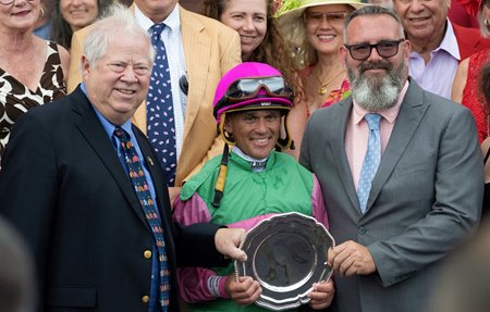 Lee Pokoik, left, in the winner’s circle with jockey Javier Castellano
