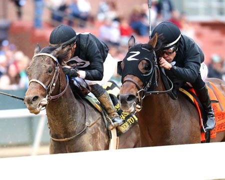 Crupper (inside) wins the Bathhouse Row Stakes at Oaklawn Park