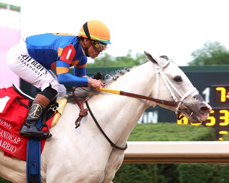 White Abarrio wins the Oaklawn Handicap at Oaklawn Park