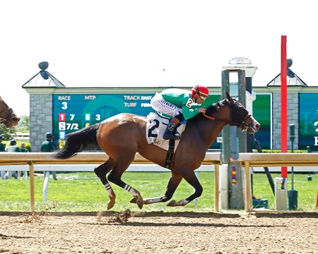 Queen Azteca wins an allowance optional claiming race at Keeneland