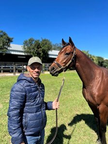 Nelson Arroyo with the Jack Christopher colt consigned as Hip 822 to the OBS Spring Sale