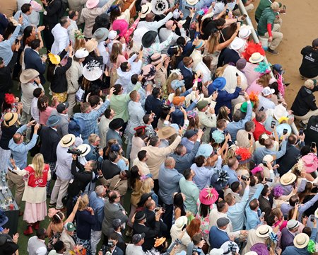 Kentucky Derby fans attempt to capture the moment earlier this year at Churchill Downs