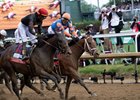 Kentucky Derby presented by Woodford Reserve, (G1) winner Jose Ortiz, aboard Golden Tempo, left, looks over to second-place finisher brother, Irad Ortiz, Jr., on Renegade, right, after crossing the finish line at Churchill Downs in Louisville, Ky., on May 2, 2026.



