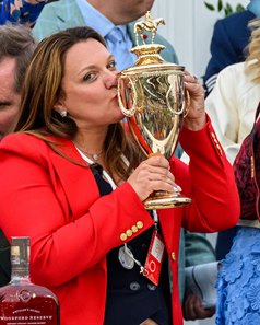 Trainer Cherie DeVaux holds the Kentucky Derby trophy after Golden Tempo won the Run for the Roses at Churchill Downs