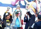 Jockey Paco Lopez (L), Owner Al Gold and Trainer Chad Summers hold up the Preakness Stakes trophies after Napoleon Solo won the $2,000,000 Grade I Preakness Stakes at Laurel Racecourse on Saturday May 16, 2026. Photo By Bill Denver/EQUI-PHOTO