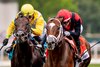 Yellow Card with jockey Flavien Prat, right, wins the Twin Spires Turf Sprint at Churchill Downs in Louisville, Ky., on May 2, 2026.