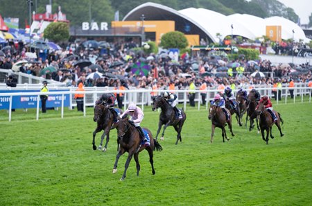 Christmas Day leaves the field behind in the Epsom Derby at Epsom Downs Racecourse