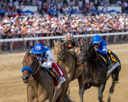 Nysos leads the way home in the Metropolitan Handicap at Saratoga Race Course
