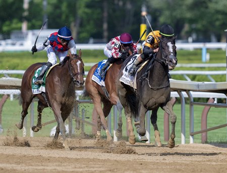 Counting Stars (right) defeats Always a Runner (left) in the Acorn Stakes at Saratoga Race Course