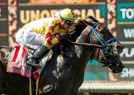 Freedom's Not Free (outside) surges late to win the Daytona Stakes at Santa Anita Park
