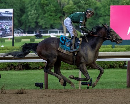 Jockey Jose Ortiz reacts to winning the Belmont Stakes aboard Golden Tempo at Saratoga Race Course