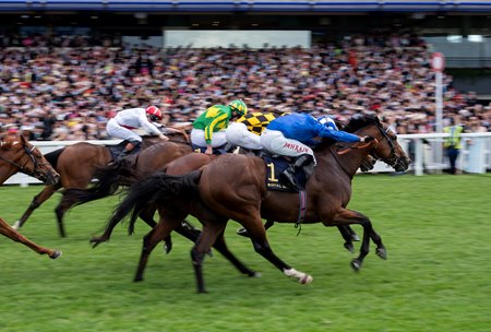Almeraq (inside) rallies to prevail in the Queen Elizabeth II Jubilee Stakes at Ascot Racecourse