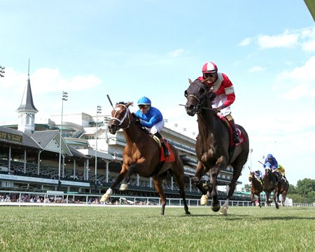 Burnham Square (inside) wins the Chorleywood Stakes at Churchill Downs