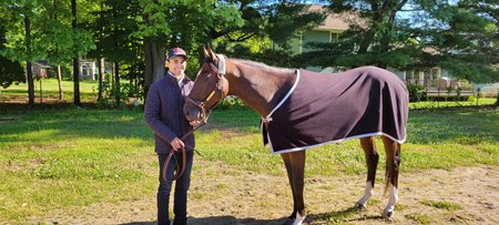 Exercise rider and assistant Enrique Miranda with Golden Tempo after they trained over the main track at Saratoga Race Course