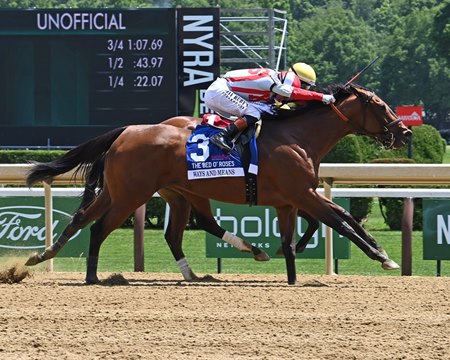 Ways and Means (outside) works her way past Grand Job to repeat in the Bed o' Roses Stakes at Saratoga Race Course