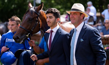 Trainer Charlie Appleby (far right) with Inner City Blues after the colt's victory in the July Stakes at Newmarket Racecourse