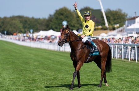 Billy Loughnane celebrates aboard Bow Echo after their victory in the Sussex Stakes at Goodwood Racecourse