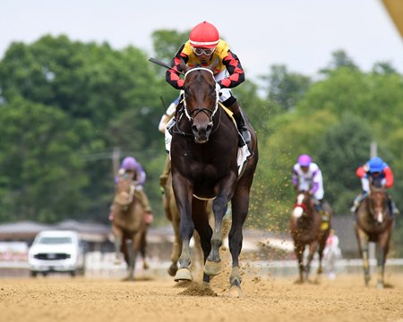 Booked rolls to victory in the Sanford Stakes at Saratoga Race Course