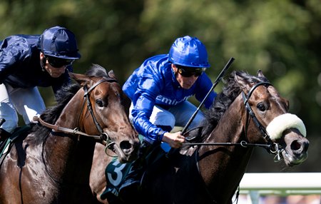 Al Hudaiba (right) wins the Superlative Stakes at Goodwood
