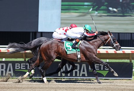 Bishops Bay (outside) wins the Philip H. Iselin Stakes at Monmouth Park
