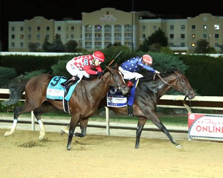Niche (inside) wins the Charles Town Oaks at Charles Town Races
