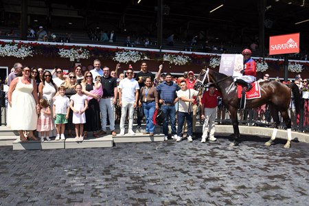 Luis Saez celebrates his 4,000th North American victory after Rothschild wins an allowance optional claimer at Saratoga Race Course