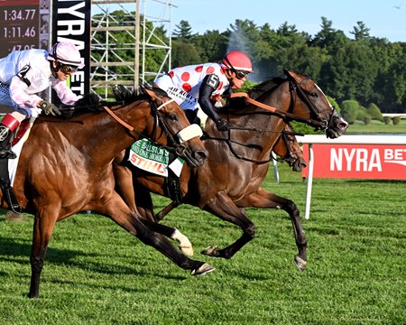 And One More Time (center) wins the Ballston Spa Stakes at Saratoga Race Course