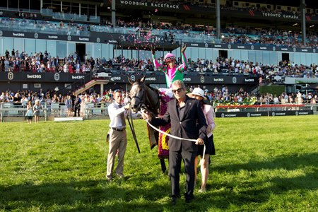 Luster returns to the winner's circle after winning The King's Plate at Woodbine