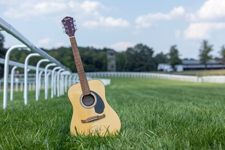 A guitar signed by Kid Rock that will serve as a trophy for a graded stakes race at at Kentucky Downs