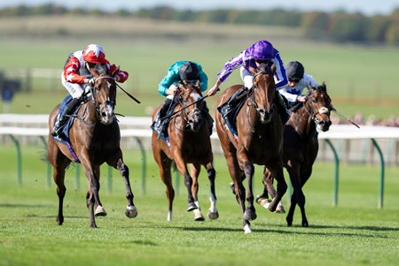 Sun Goddess (purple cap) wins the Cheveley Park Stakes at Newmarket Racecourse