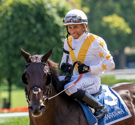 Mashallah heads to the Saratoga Race Course winner's circle after her Prioress Stakes win