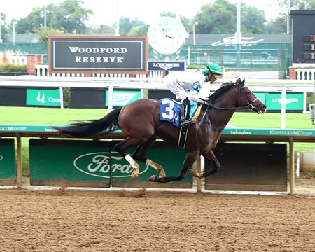 Coach Pope cruises to a 12 1/2-length victory in a maiden special weight race at Churchill Downs