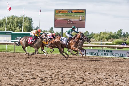 Military Time (green silks) wins the Prince of Wales Stakes at Fort Erie