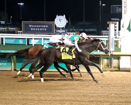 Conceit (outside) rallies to win the Dogwood Stakes at Churchill Downs