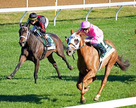 Malibu Smart (inside) wins the Dowager Stakes at Keeneland