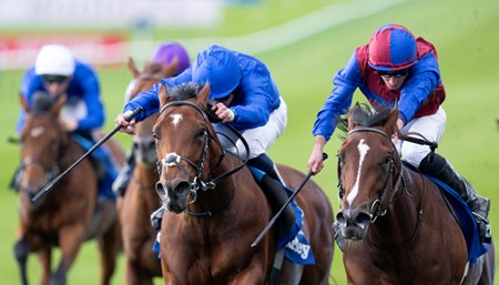 Darkness Falls (inside) beats Desert Castle in the Dewhurst Stakes at Newmarket Racecourse