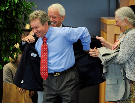 Don Pierce dons his ceremonial jacket at the 2010 Racing Hall of Fame induction ceremony
