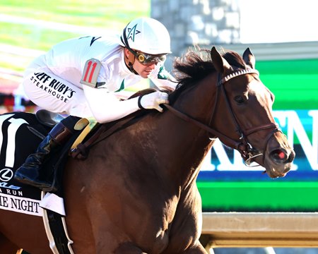 Movie Night, under Flavien Prat, wins the Raven Run Stakes at Keeneland