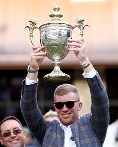Will Walden celebrates Rhetorical's second win in the Turf Mile at Keeneland