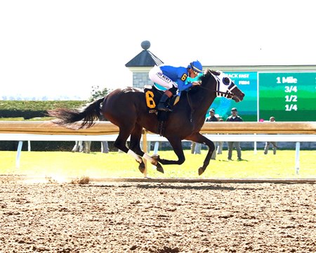 Jump Seat wins a maiden special weight race at Keeneland